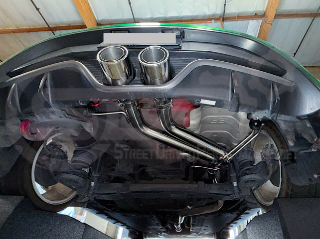 Hyundai Veloster Turbo exhaust axle back with dual 4-inch burnt tip or chrome axle, featuring Street Driven Performance branding.