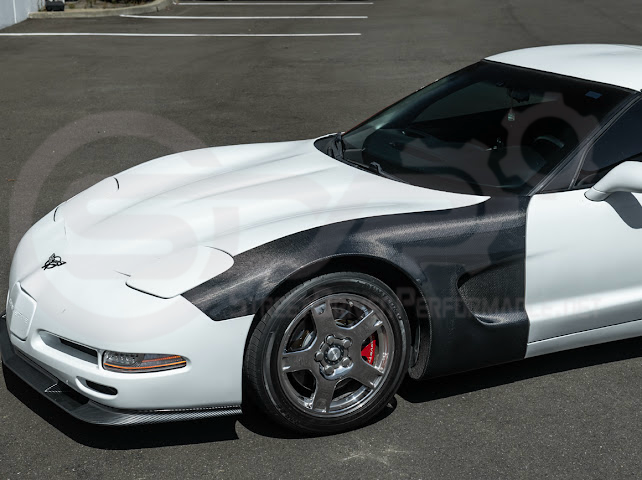 Factory style carbon fiber front and rear widebody fenders for 1997-2004 Chevrolet Corvette C5 hatchback by Street Driven Performance.