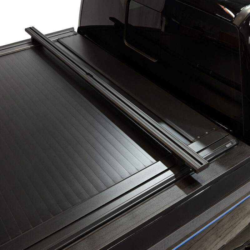 Westin black retractable tonneau cover on Ford F-250/F-350 SD 6.8ft truck bed, showing the sleek, secure design.