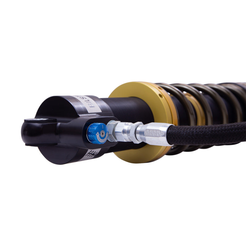 Bilstein coilovers with black shock and coil spring assembly for Can-Am Maverick X3 Max RS Turbo off-road vehicle.