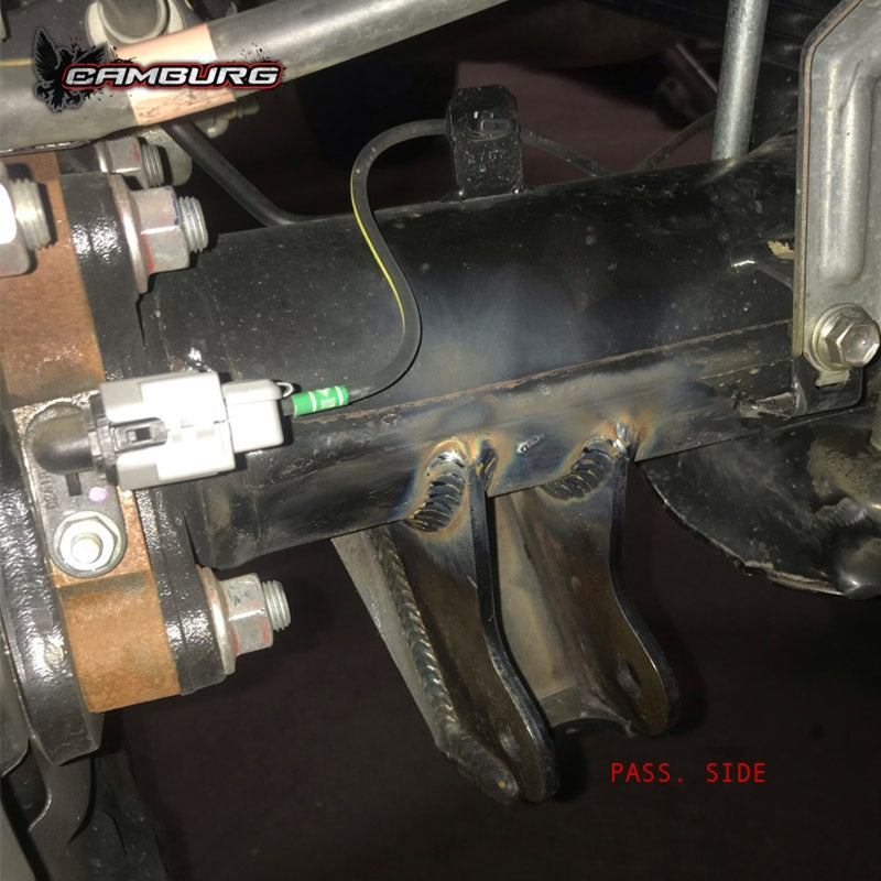 Camburg Toyota Tundra 07-21 rear shock mount kit showing metal mounts and hardware for 2WD and 4WD models.