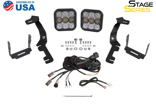 Diode Dynamics Stage Series ditch light bracket kit mounted on a 2019-present Ram truck for off-road lighting.