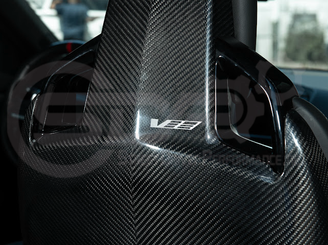 Pair of black carbon fiber seat back panels for Cadillac CT5-V and CT5-V Blackwing interior, driver and passenger side, by Street Driven Performance.