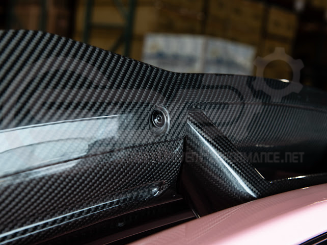 Ford Mustang Dark Horse style carbon fiber rear wickerbill spoiler wing for 2015-2023, shown on vehicle with sleek aerodynamic design.