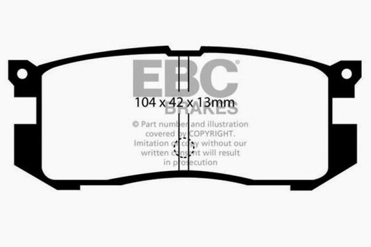 EBC Ultimax rear brake pads for 89-92 Ford Probe 2.2, OE type, shown installed on vehicle's rear brake assembly