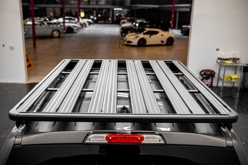 Rival 4x4 aluminum roof rack installed on Ford Ranger Raptor, sturdy and lightweight for outdoor gear transport.