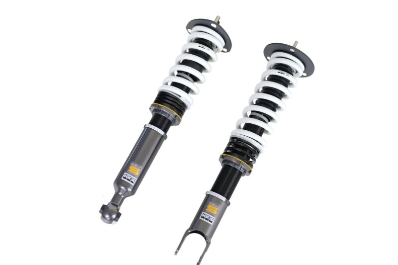 HKS Hipermax S coilover kit installed on a JZA80 Toyota Supra, showcasing adjustable shocks and suspension components.
