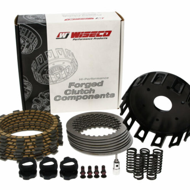 Wiseco clutch fiber kit showing 8 fiber clutch basket components for motorcycle clutch assembly.