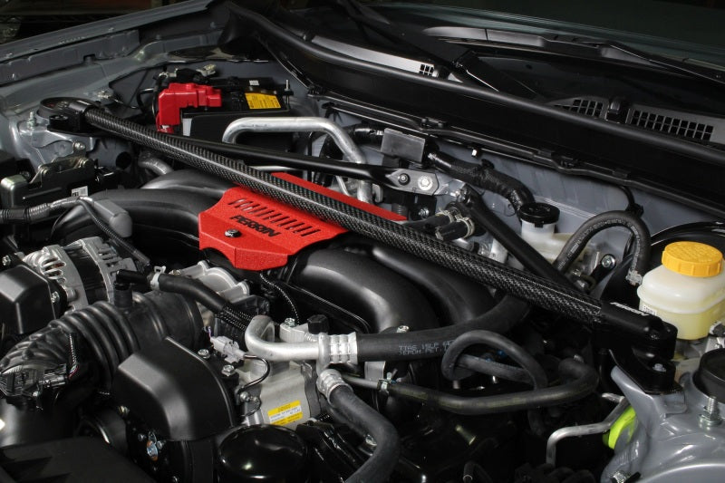 Perrin Performance carbon fiber front strut brace for Subaru BRZ, Toyota GR86, 86, and Scion FR-S, enhancing chassis rigidity.