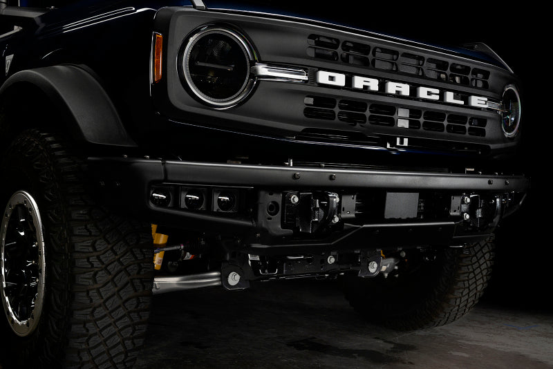 Oracle Lighting 21-22 Ford Bronco triple LED fog light kit installed on steel bumper, white fog lights for off-road vehicles.