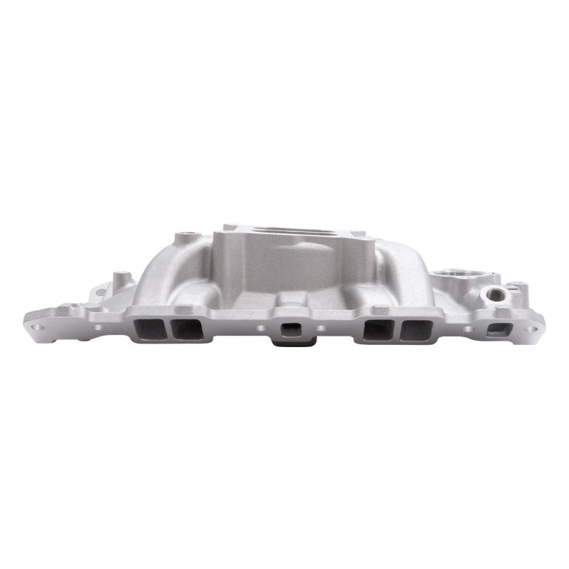Edelbrock Performer EPS intake manifold with oil fill tube and breather for Small-Block Chevy engine, installed on engine block.