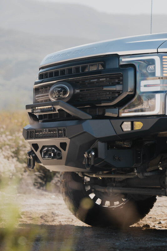 Steel front bumper for Ford Super Duty F-250/F-350 from DV8 Offroad Spec Series, rugged and durable for off-road use.