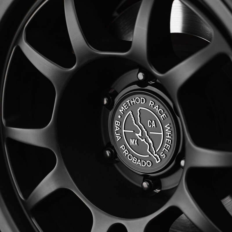 Black Method Cap BAJA 64MM snap-in wheel center cap for Method Wheels, featuring the brand logo and sleek design.