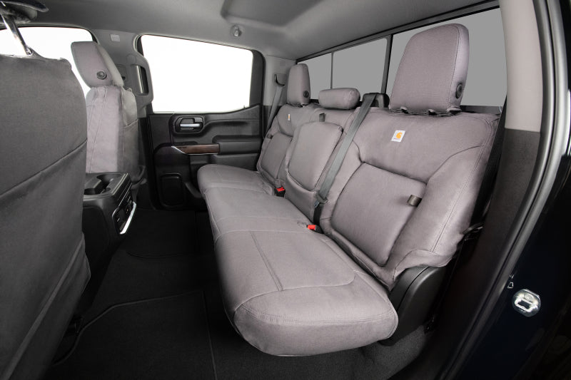 Covercraft Carhartt PrecisionFit second row seat covers for Toyota Grand Highlander in durable fabric, fitted over car seats.