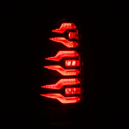AlphaRex Luxx-Series LED tail lights for Lexus GX470 14-21 in Alpha-Black finish, showing sleek automotive lighting design.