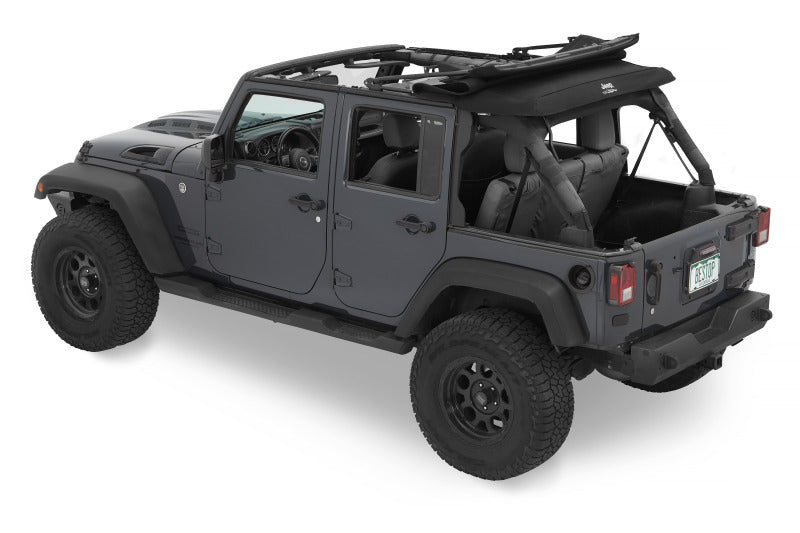 Bestop Jeep Trektop Glide soft top for 2007-2018 Jeep Wrangler JK 4-door in premium black twill fabric, shown installed on vehicle.