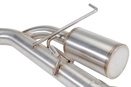 Perrin Performance 22-26 Subaru WRX single exit catback exhaust system installed on a vehicle, showcasing the stainless steel pipe and muffler.