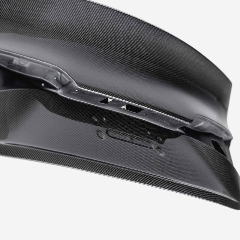 Seibon carbon fiber trunk lid for 2022-2023 Honda Civic 4-door, C-Style design, showing the sleek, textured carbon fiber surface.
