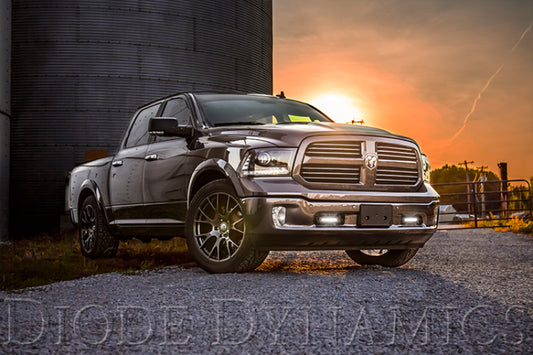 Diode Dynamics Ram 2013 Standard Stage Series 6-inch amber driving light bar installed on a vehicle.
