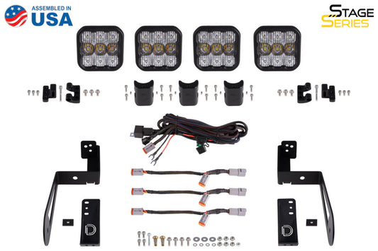 Diode Dynamics Jeep JK SS5 4-Pod CrossLink grille lightbar kit with yellow and white LED light bars on a black grille.