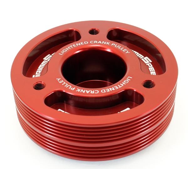 Black lightweight GrimmSpeed Subaru crank pulley for underdrive performance, shown in close-up with polished finish details.