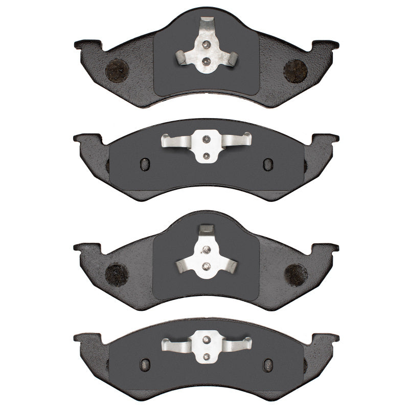 R1 Concepts Dodge Durango front ceramic brake pads, OE type, with metallic backing and brake pad friction surface.