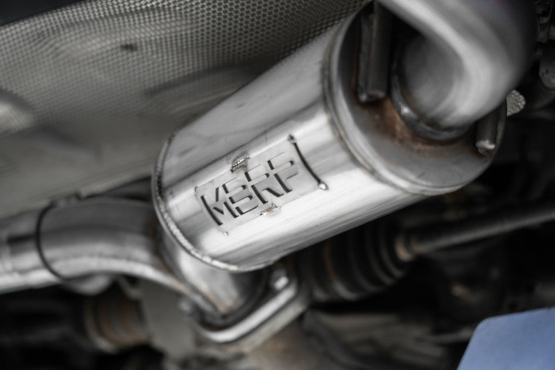 MBRP T304SS 2.5-inch axle-back exhaust for Mazda 3 hatchback with dual rear exit and carbon fiber tips, stainless steel construction.