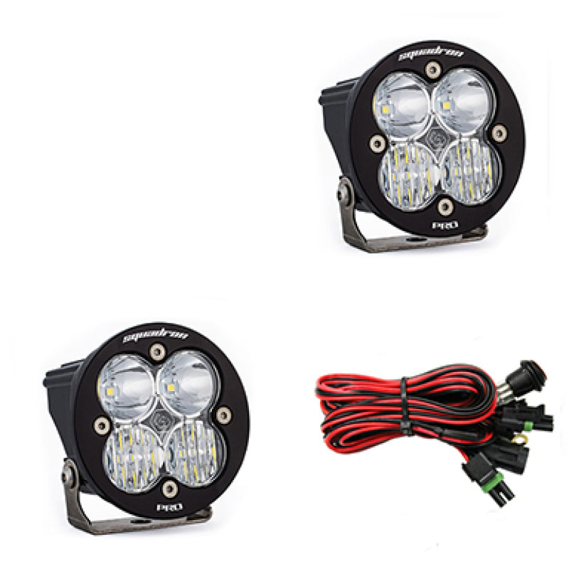 Pair of Baja Designs Squadron R Pro LED light pods for driving and combo lighting, mounted on a vehicle.