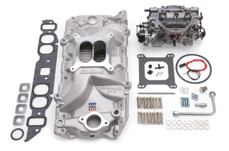 Edelbrock Performer RPM Big Block Chevrolet oval port intake manifold and carburetor kit in natural finish