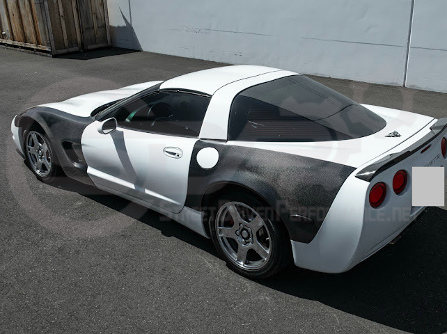 Factory style carbon fiber front and rear widebody fenders for 1997-2004 Chevrolet Corvette C5 hatchback by Street Driven Performance.