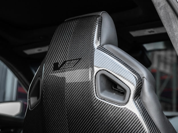 Cadillac ATS-V sedan Recaro carbon fiber seat rear panel cover replacement, driver and passenger side, by Street Driven Performance.