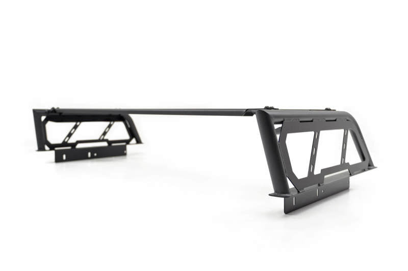 DV8 Offroad MTO Series adjustable truck bed rack for Toyota Tundra and Ford F150 Raptor, sturdy exterior bed accessory.