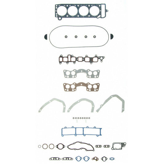 Fel-Pro Toyota Pickup PermaTorque engine cylinder head gasket set with multiple gaskets and sealing components arranged on a surface.