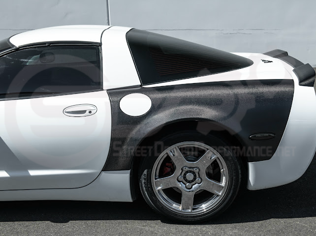 Factory style carbon fiber front and rear widebody fenders for Chevrolet Corvette C5 hatchback, by Street Driven Performance.