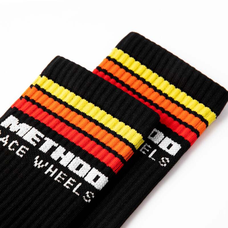 Black Method Wheels Classic Stripes Logo Performance Socks featuring bold stripe pattern and logo detail.