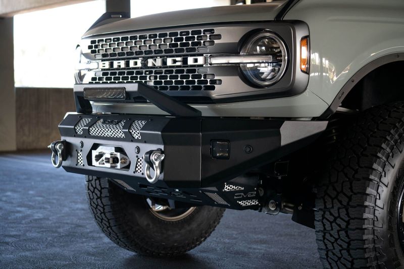 Steel DV8 Offroad Bull Bar add-on for Ford Bronco bumpers with 13-inch Elite Series light bar, featuring rugged offroad design.