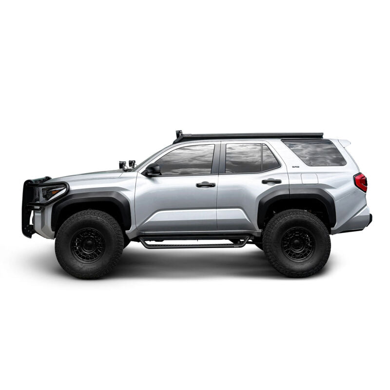 Westin 25-26 Toyota 4Runner Mesa roof rack installed on vehicle roof, showcasing durable metal construction and mounting points