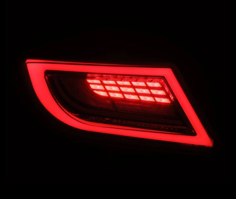 AlphaRex LUXX LED taillights for Toyota GR86 22-24 in black smoke with sleek design and modern LED lighting.