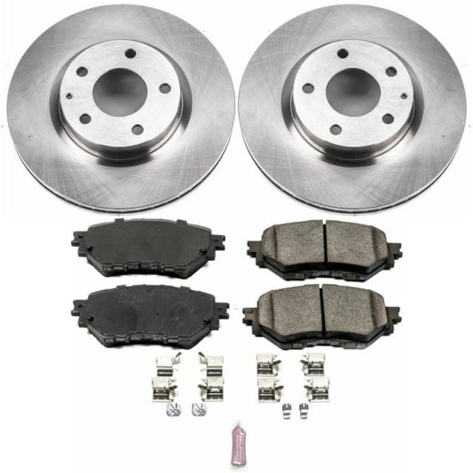 PowerStop OE front brake kit for Mazda 3 2017-2018, including brake pads and rotors, installed on vehicle.