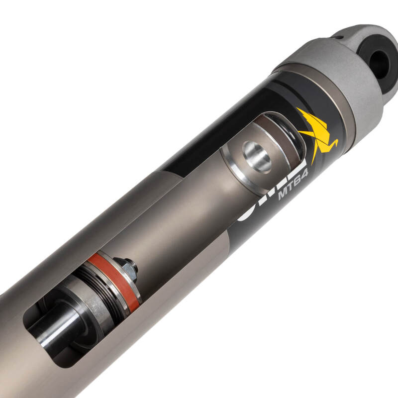 Old Man Emu ARB OME MT64 rear right shock absorber for Tacoma, showing the durable shock with mounting components.