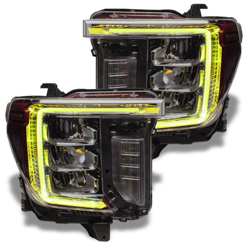 Oracle Lighting GMC Sierra 2500/3500 HD RGB+W headlight DRL kit with BC1 controller, showing modern LED headlight components.
