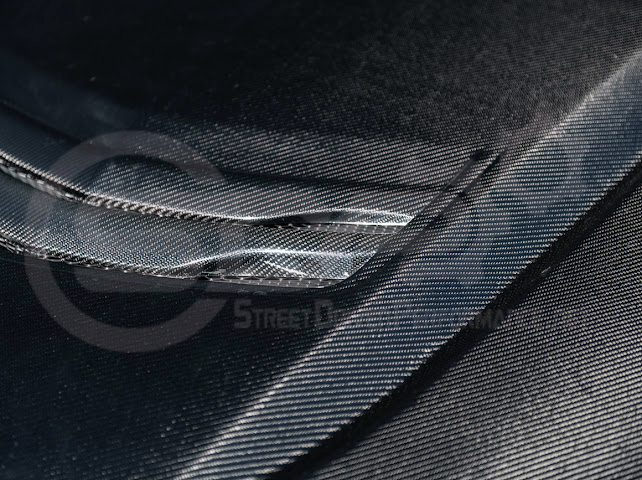 Black Wing style carbon fiber vented front hood for 2020+ Cadillac CT4, CT4-V, and CT4-V Black Wing by Street Driven Performance.