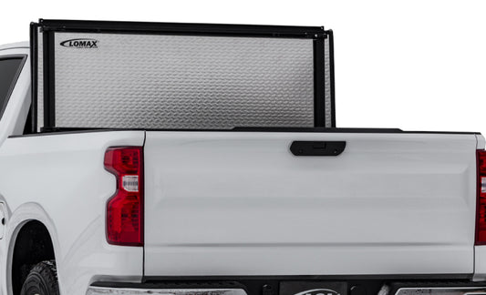 Access 2022+ Toyota Tundra 5ft 6in Bed LOMAX Stance folding hard cover with urethane diamond plate finish, designed for truck bed protection.