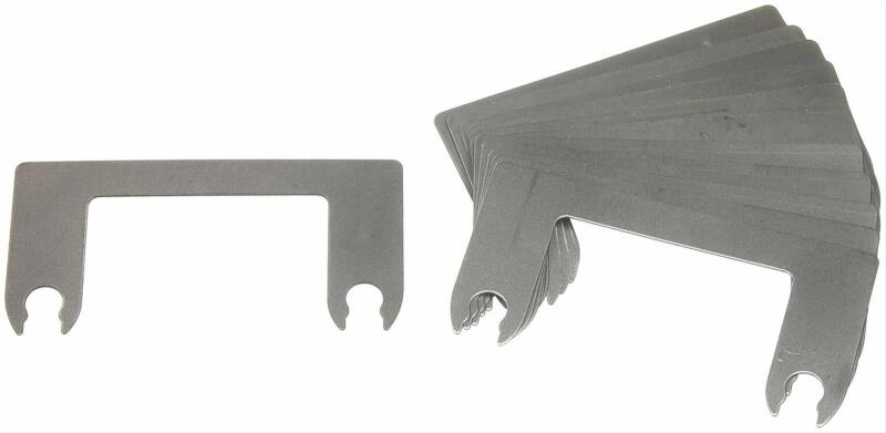 Moog 1/8 inch white tandem shim for Volvo suspension alignment, showing the metal shim used in vehicle wheel alignment kits.