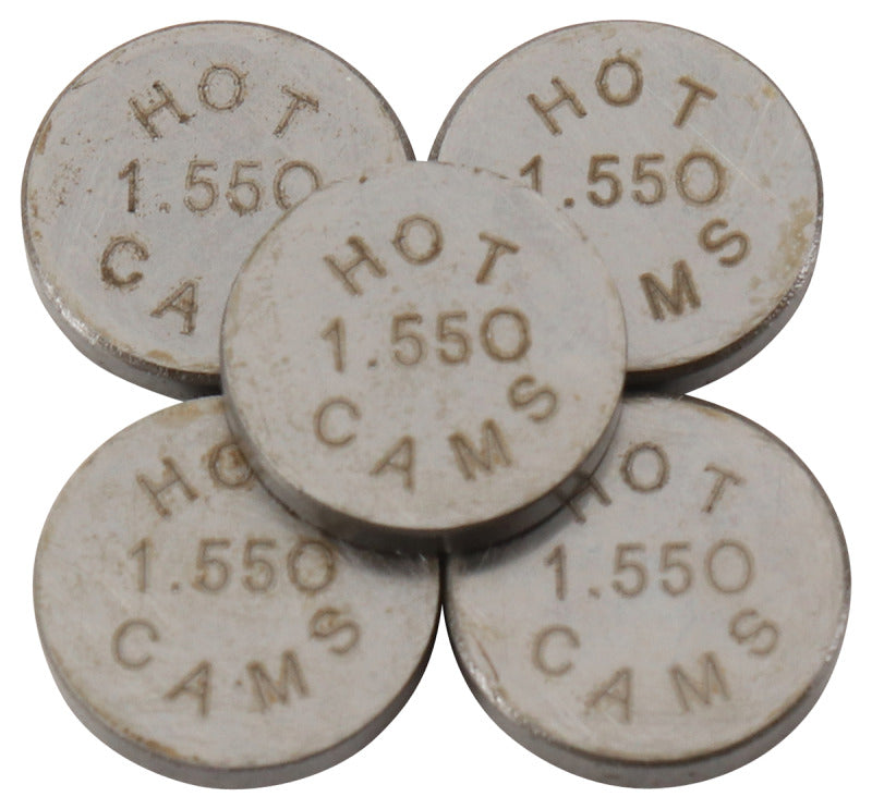 Hot Cams 04-08 400 DVX and 02-16 CRF 450 R valve shim kit, 5-pack, showing shiny metal shims arranged in a tray.