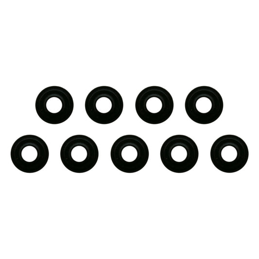 Fel-Pro Nissan Altima engine valve cover grommet set showing multiple black rubber grommets for valve cover installation.