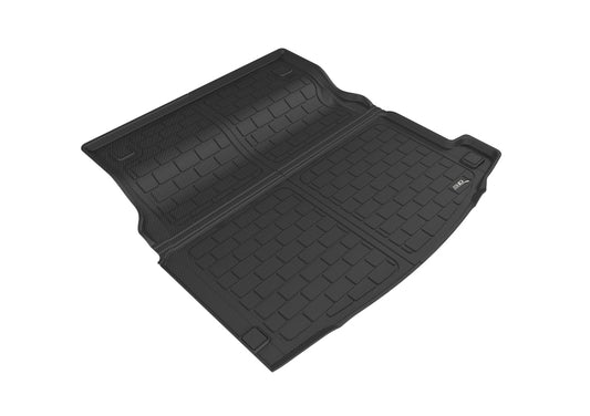 Black 3D MAXpider rubber cargo liner for Mercedes-Benz E-Class (2017-2019) with 3D textured design, fits the rear cargo area.