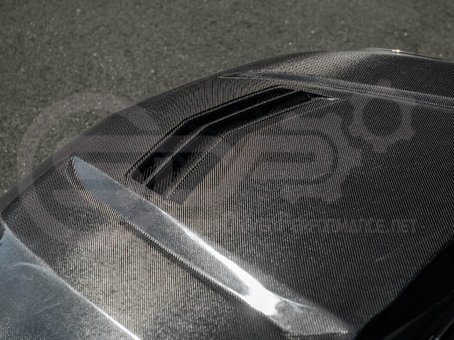 Black wing style carbon fiber vented front hood for 2020+ Cadillac CT4, CT4-V, and CT4-V Black Wing by Street Driven Performance.