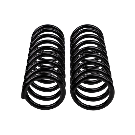 Old Man Emu ARB/OEM front coilover coil spring for Land Cruiser II, durable suspension component in natural setting