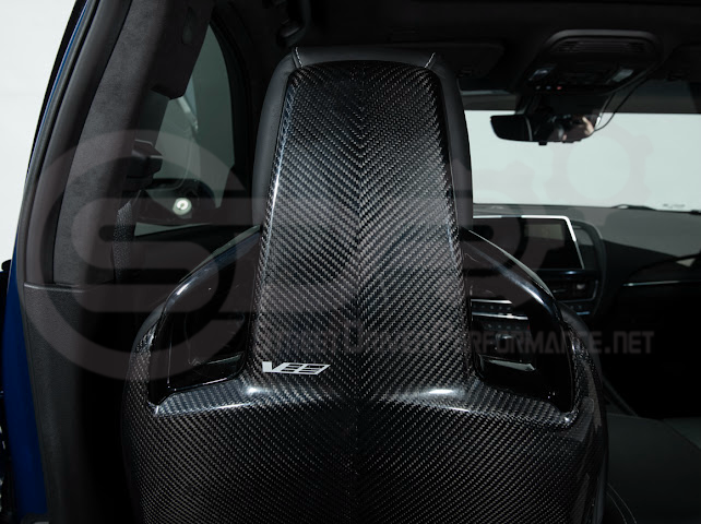 Pair of black carbon fiber seat back panels for Cadillac CT5-V and CT5-V Blackwing interior dash trim, driver and passenger side.